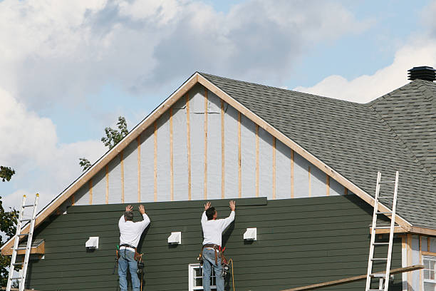 Professional Siding Installation technician working in Matthews, NC